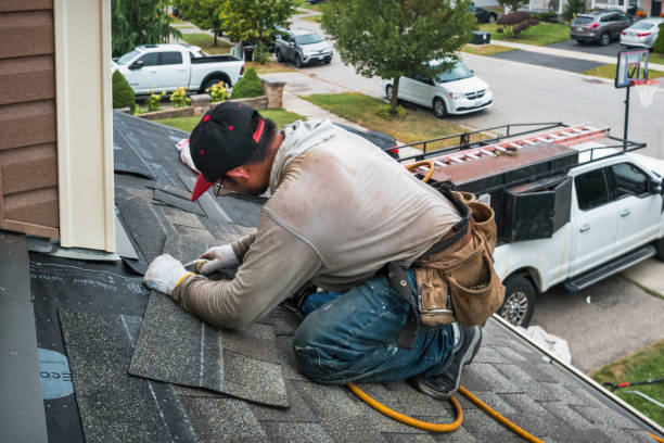Professional Roofing technician working in Freeport, ME